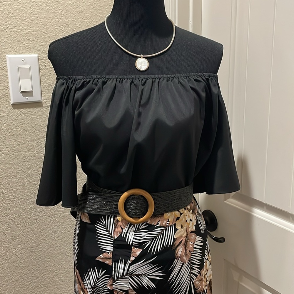 Elegant Black Off-Shoulder Top with Tropical Print Shorts